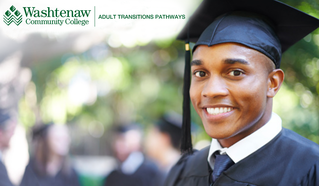 smiling graduate in cap and gown