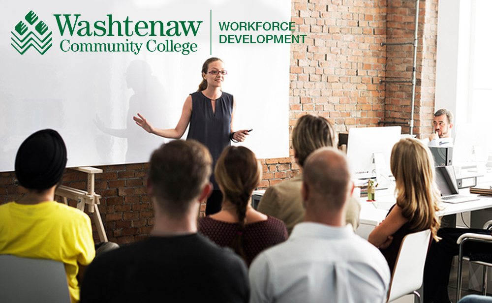 woman training a classroom of people woman training a classroom of people