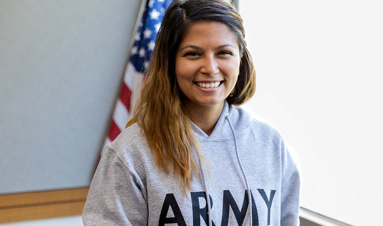 female army veteran smiling