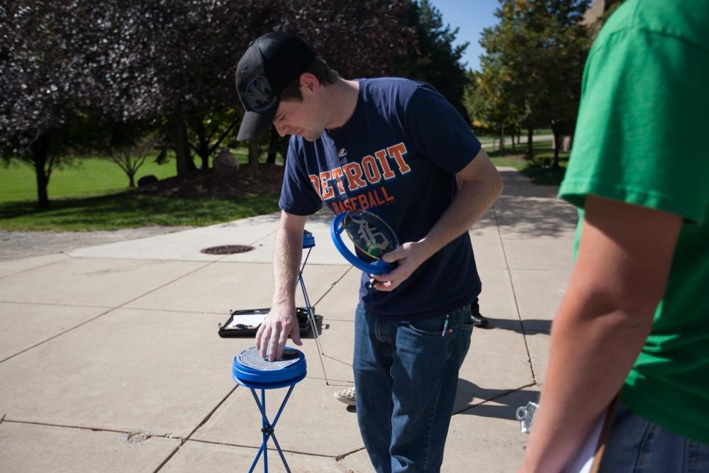 Renewable Energy student sets up Solar Pathfinder instrument