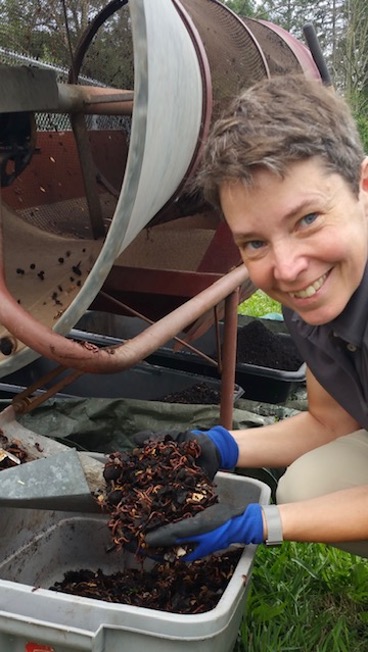 Rebecca Andrews working on recycling