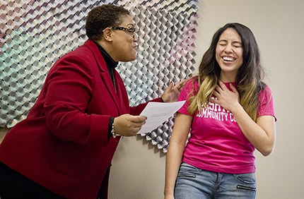  Kelly Gampel Maria Paula Salazar is in disbelief as Washtenaw Community College Vice President for Instruction Dr. Kim Hurns tells her she is the only Michigan student to receive the Jack Kent Cooke Foundation’s Undergraduate Transfer Scholarship April 10 at a small celebration.