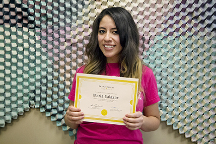  Maria Paula Salazar received a certificate April 10 celebrating her receipt of the Jack Kent Cooke Foundation’s Undergraduate Transfer Scholarship.