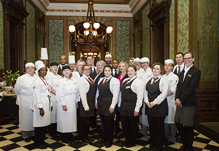 Kelly Gampel WCC culinary students pose for a photo before the start of service at Community College Day at the Michigan State Capitol April 19. Approximately two dozen students, faculty and staff came together to serve Michigan-themed foods to government officials.