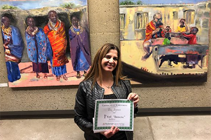 Therese Basha Jarjoura with her WCC Student Art Show entries, including Best of Show winner "Bridging" on right. Therese Basha Jarjoura with her WCC Student Art Show entries, including Best of Show winner "Bridging" on right.