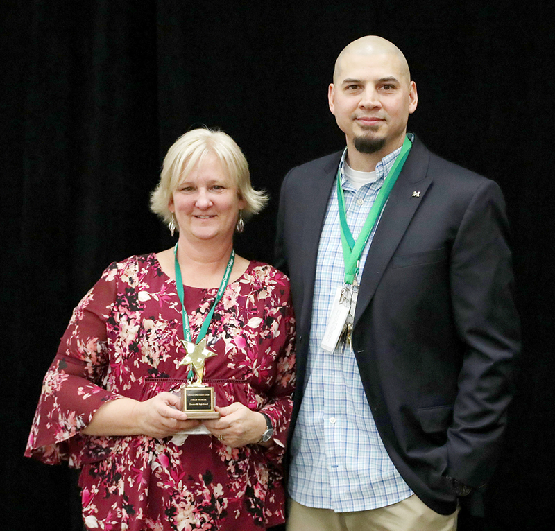 Justin Villenueva with his high school counselor, Joelle Troszak.