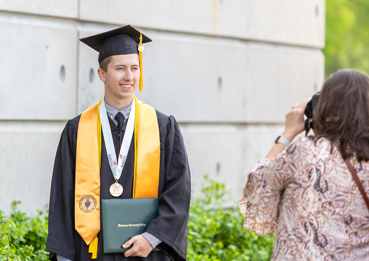 Caleb Rogers in cap and gown