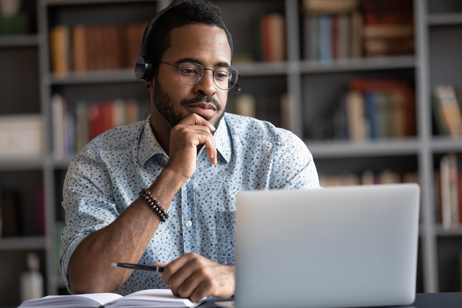 man taking online class