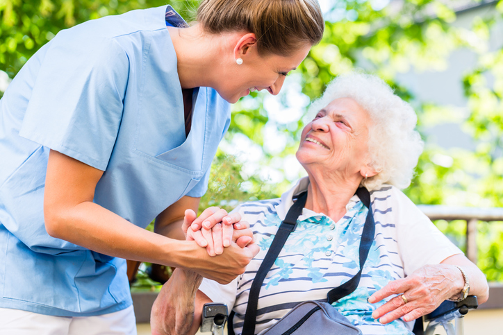 Health Care worker assisting senior citizen