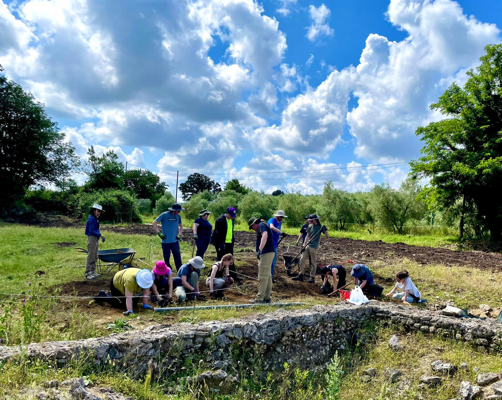 Study abroad group at dig site