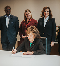 Dr. Bellanca signing MOU