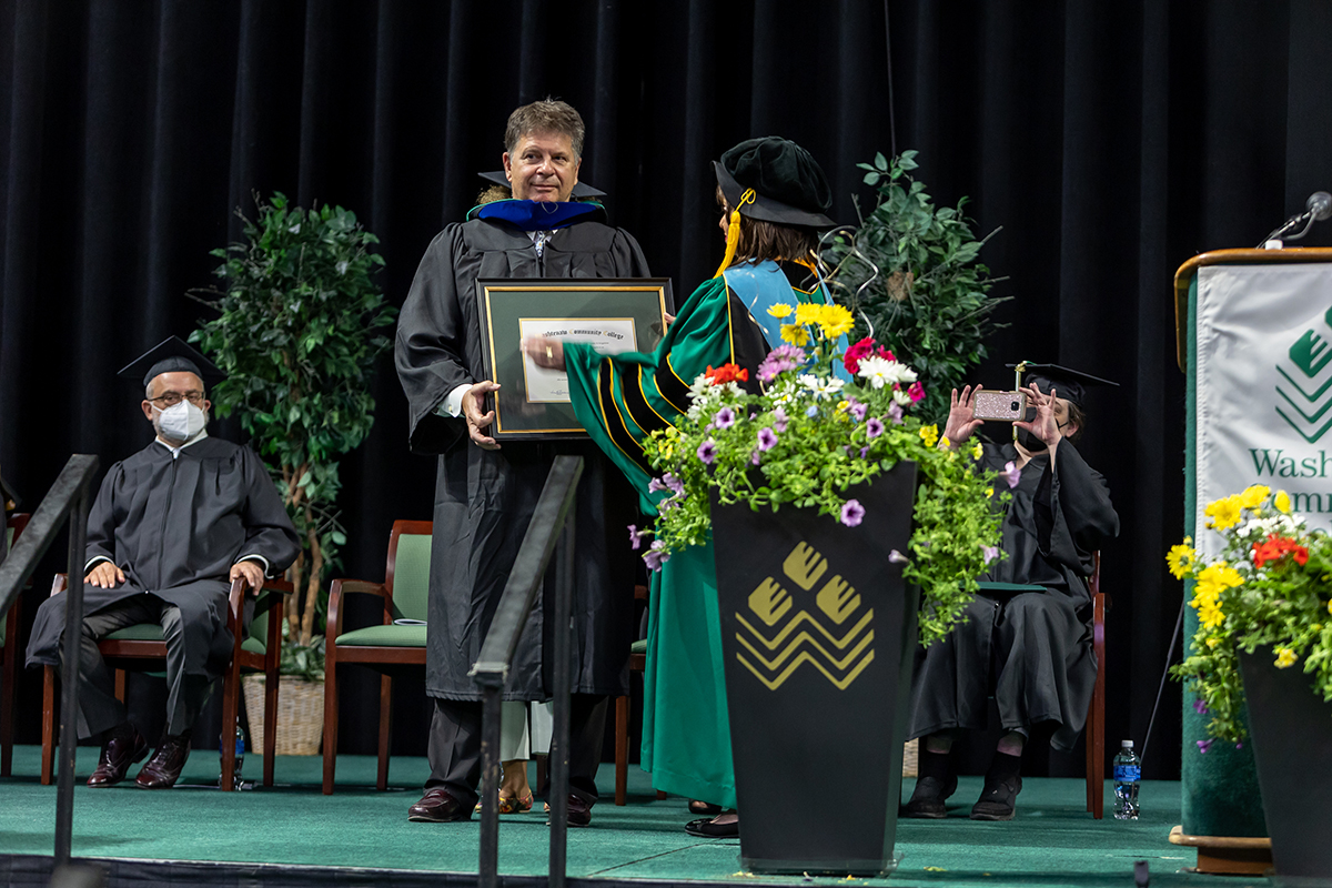 Paul Krutko receiving award