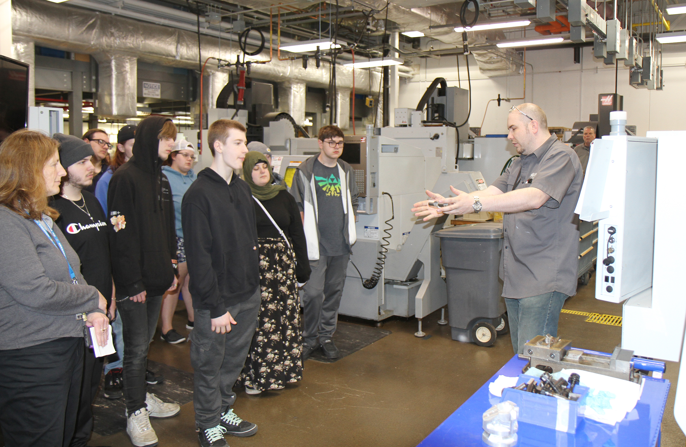 High school students tour CNC lab