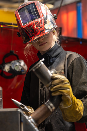 Mikala Sposito inspects her weld