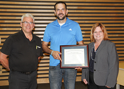 Mitch Smith (center) with Milan Steel Systems tooling manager Doug McCormick (left) and WCC Dean of Apprenticeships & Skilled Trades Marilyn Donham.