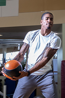 Donald Scott II with medicine ball