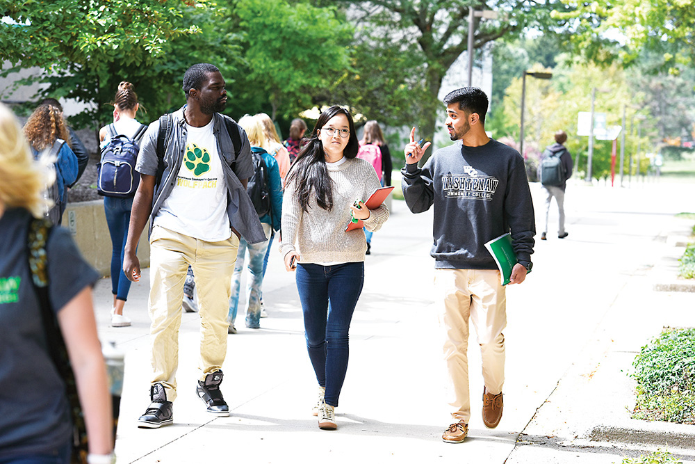 Students (from left) Paul Katokwe, Undraa Bayasgalan and Shahzar Mirza walk across a busy WCC campus during the first week of the Fall 2017 semester. | Photo by Lon Horwedel Students (from left) Paul Katokwe, Undraa Bayasgalan and Shahzar Mirza walk across a busy WCC campus during the first week of the Fall 2017 semester. | Photo by Lon Horwedel