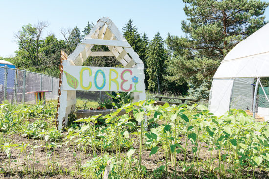 The on-campus Hoop House CORE Garden produces crops that are distributed on campus in the community. Plans call for traveling food carts to be placed in key low-income neighborhoods near the college. (Photo by CJ South) The on-campus Hoop House CORE Garden produces crops that are distributed on campus in the community. Plans call for traveling food carts to be placed in key low-income neighborhoods near the college. (Photo by CJ South)