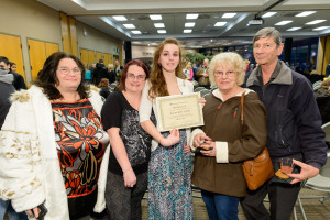 Krystia Faleris celebrates making the Dean’s List with family.