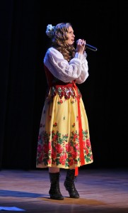 Singer and WCC student Christina Wallag representing Poland. Photo by Lynn Monson Singer and WCC student Christina Wallag representing Poland. Photo by Lynn Monson