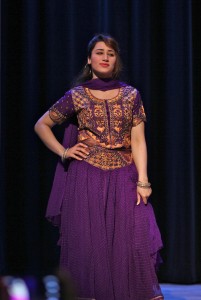 WCC student Maha Javed representing Pakistan in the fashion show. Photo by Lynn Monson