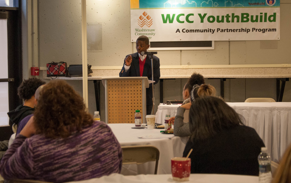 Davon Shackleford, president of WCC’s chapter of Phi Theta Kappa, delivers a powerful speech to the YouthBuild inductees.