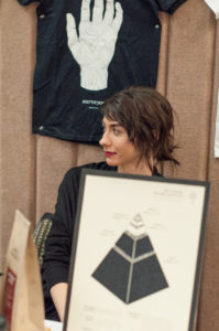 WCC graphic design technology graduate Rosie Schrag displays some of her work. (Photo by Jessica Bibbee)