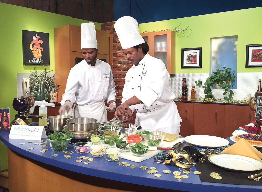 WCC culinary student Jeremy Robertson, left, and WCC Culinary Arts Faculty Derek Anders Jr. demonstrate their culinary skills live on the set of FOX 2 News. Photo by Susan Ferraro