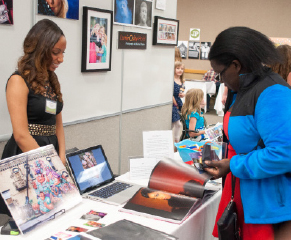 Photo student Jessica Pierce with her portfolio.