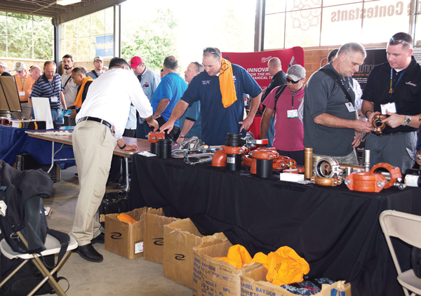 UA instructors line up to check out new technologies during Industry Day at the group’s annual skills training program on the WCC campus.