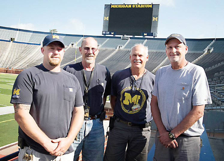 University of Michigan Athletics maintenance technicians (from left) Jim Turner, Kevin Wilkins, Phil Stanny and Tim Larsen are completing an apprenticeship program at Washtenaw Community College. | Photo by Kelly Gampel University of Michigan Athletics maintenance technicians (from left) Jim Turner, Kevin Wilkins, Phil Stanny and Tim Larsen are completing an apprenticeship program at Washtenaw Community College. | Photo by Kelly Gampel