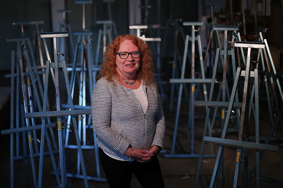 Emeritus student Claudia Dionne in an art studio