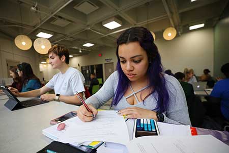 student studying in a common area