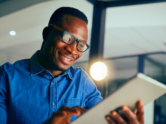 man holding a tablet